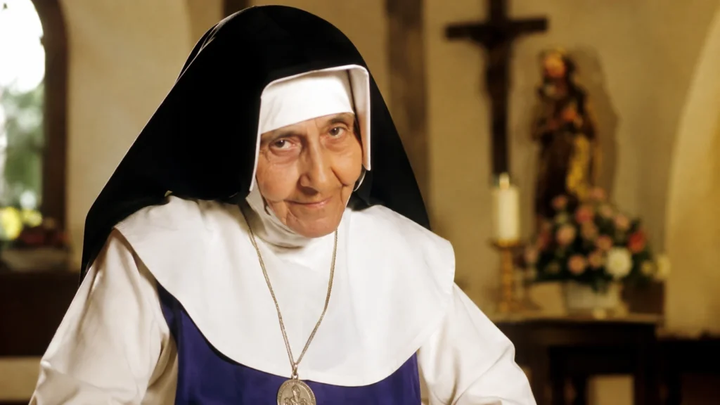 [Imagem: Retrato de Santa Dulce dos Pobres em ambiente religioso, com iluminação suave e atmosfera de fé e esperança]